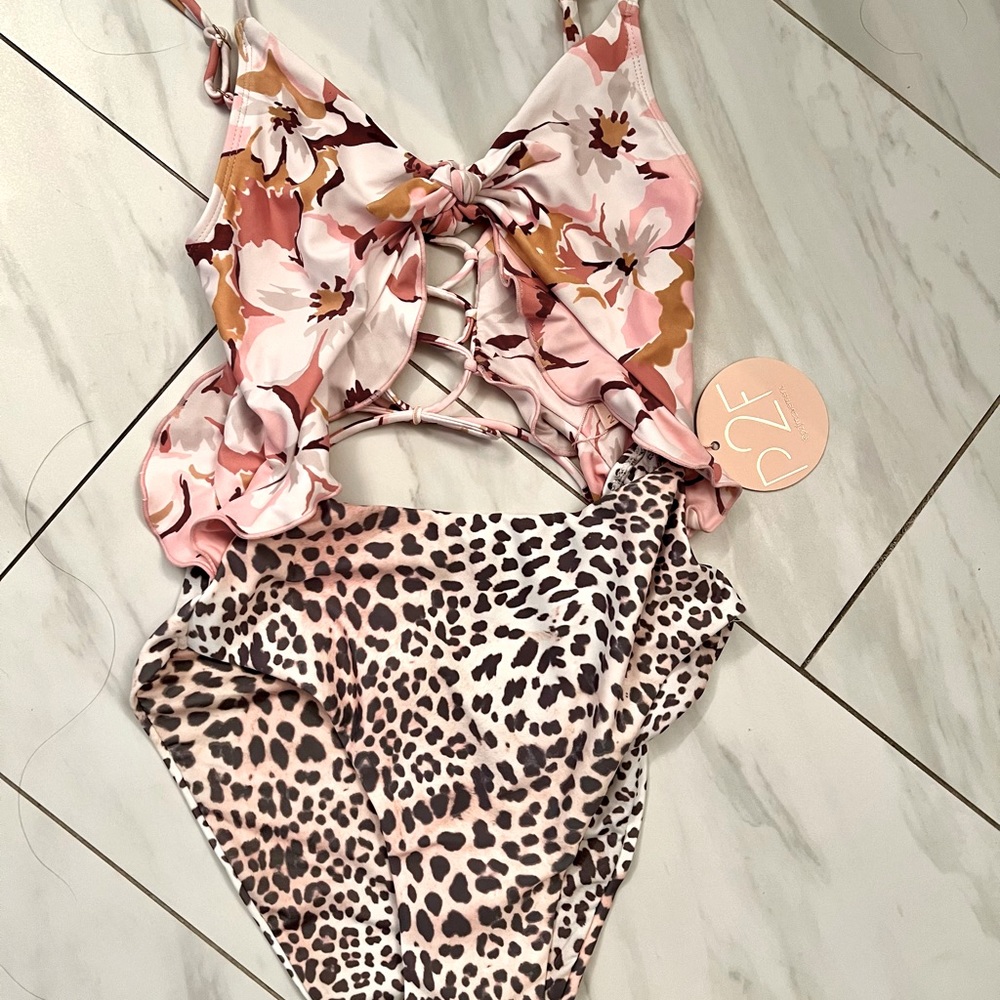 Cute one piece with leopard and floral print.